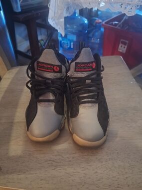 Jordan Kids Black and Gray Basketball Sneakers with Red Accents